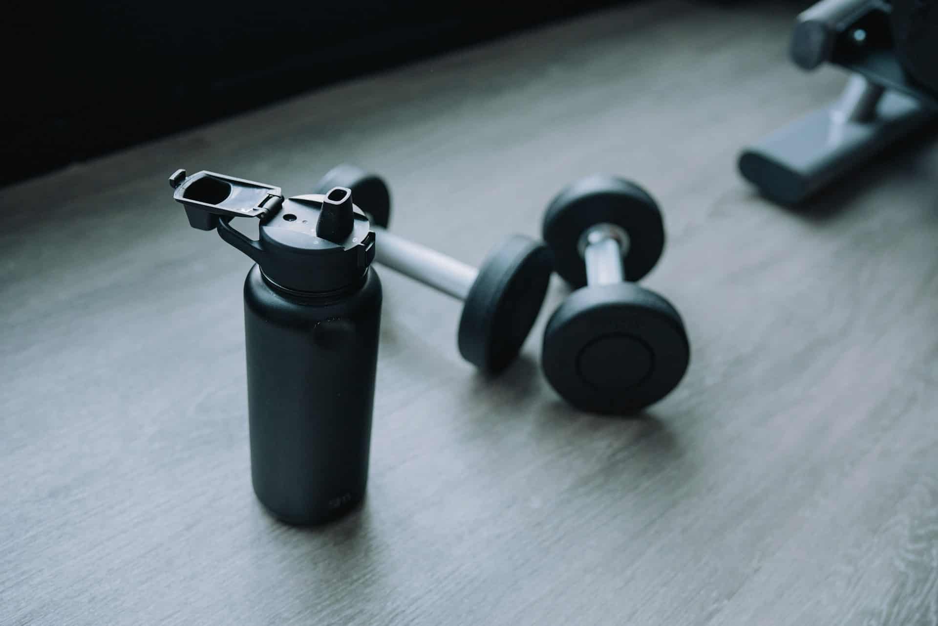dumbells and gym water bottle